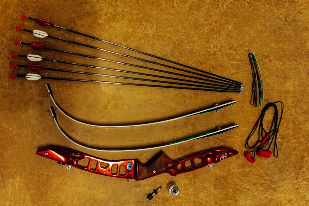 Different Types of Bows in Archery: a recurve bow set and arrows